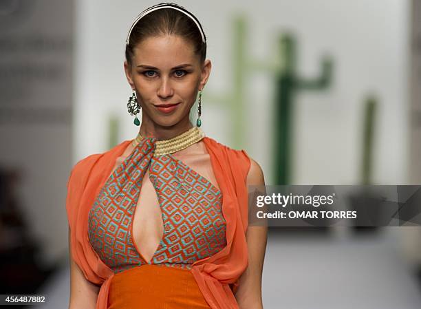 Model displays a creation by Mexican designer Lydia Lavin during the presentaion of the Spring-Summer collection in the framework of the Fashion Week...