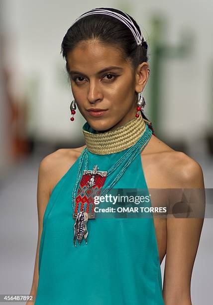 Model displays a creation by Mexican designer Lydia Lavin during the presentaion of the Spring-Summer collection in the framework of the Fashion Week...