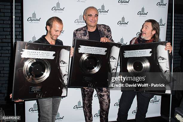 Florent Pagny, Pascal Negre and Calogero are posing at aftershow Party at La Cigale on October 1, 2014 in Paris, France.