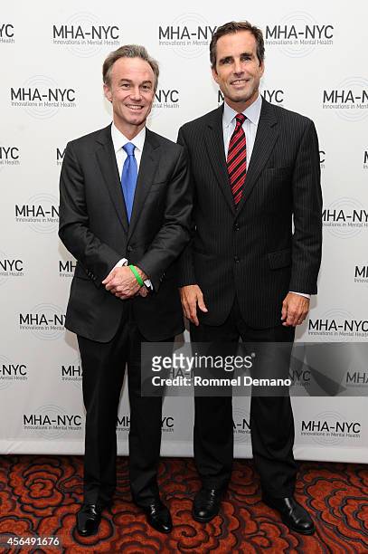Gregory J. Fleming and Bob Woodruff attend "Working for Wellness and Beyond" Gala at Mandarin Oriental Hotel on October 1, 2014 in New York City.