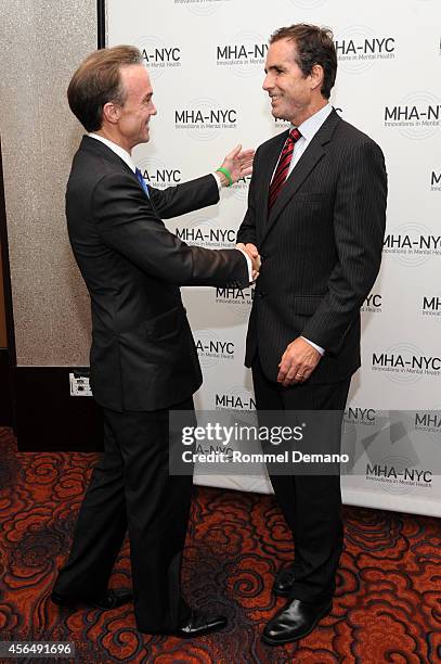Gregory J. Fleming and Bob Woodruff attend "Working for Wellness and Beyond" Gala at Mandarin Oriental Hotel on October 1, 2014 in New York City.
