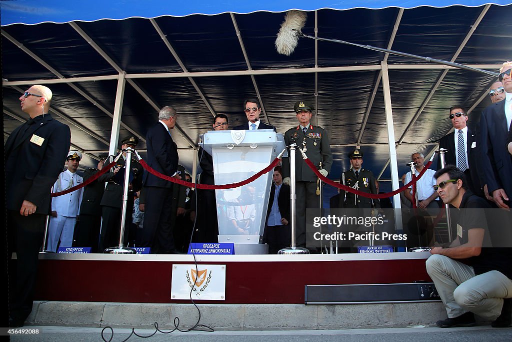 President of Cyprus, Nicos Anastasiadis (center) speaks...