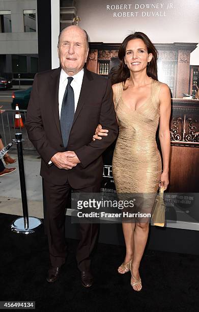 Actor Robert Duvall and wife Luciana Pedraza arrive for the Warner Bros. Pictures and Village Roadshow Pictures' Premiere of "the Judge" at AMPAS...