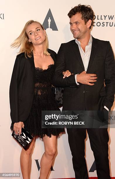 Actors Diane Kruger and Joshua Jackson arrive at a cocktail reception to celebrate the opening of the multimedia exhibition "Hollywood Costume,"...