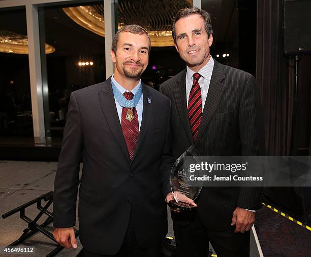 Congressional Medal of Honor Recipient and Honoree Sal Giunta and Journalist and Gala host Bob Woodruff pose for photo during the 2014 "Working for...