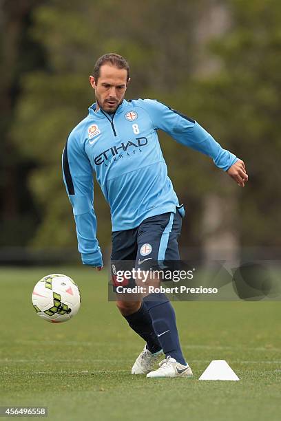 Massimo Murdocca passes the ball during a Melbourne City A-League training session at La Trobe University Sports Fields on October 2, 2014 in...