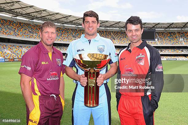 James Hopes of Queensland, Moises Henriques of New South Wales, Callum Ferguson of South Australia pose during the Matador BBQs Cup series launch at...
