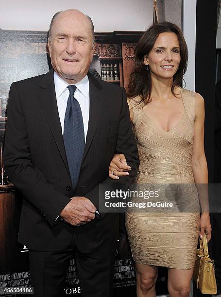 Actor Robert Duvall and wife Luciana Pedraza arrive at the Los Angeles premiere of "The Judge" at AMPAS Samuel Goldwyn Theater on October 1, 2014 in...