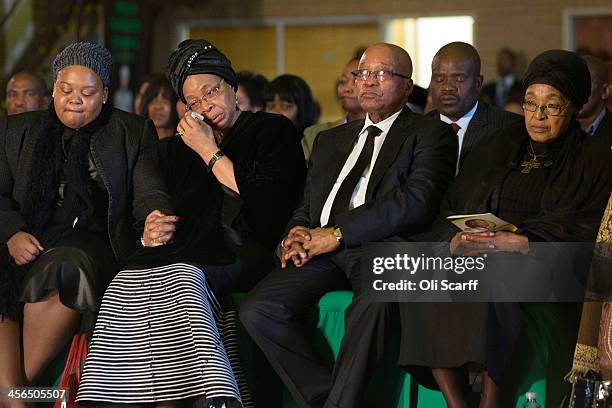 Graca Machel , widow of Nelson Mandela, South Africa's President Jacob Zuma and former wife of Nelson Mandela, Winnie Mandela listen to speeches...