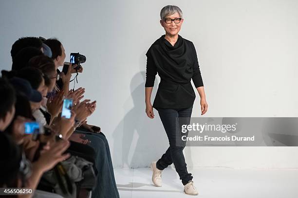 Designer Moon Young Hee walks the runway during the Moon Young Hee show as part of the Paris Fashion Week Womenswear Spring/Summer 2015 on October 1,...