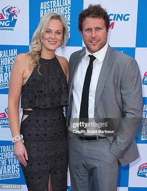 Campbell Brown and his wife Jess Brown attend the Melbourne Spring Racing Carnival Launch at the Melbourne Museum on October 2, 2014 in Melbourne,...