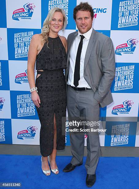 Campbell Brown and his wife Jess Brown attend the Melbourne Spring Racing Carnival Launch at the Melbourne Museum on October 2, 2014 in Melbourne,...