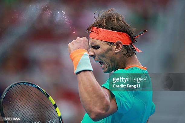 Rafael Nadal of Spain celebrates a ball against Peter Gojowczyk of Germany during day six of the China Open at the China National Tennis Center on...