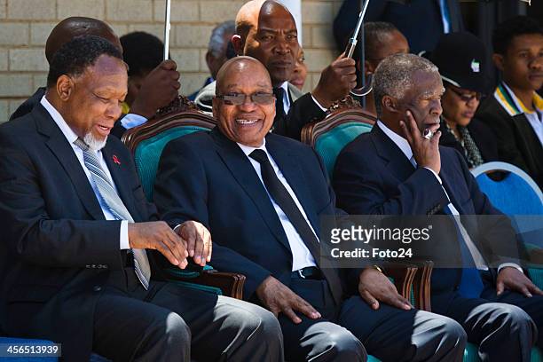 President Jacob Zuma with Thabo Mbeki and Kgalema Motlanthe at the official send-off for Nelson Mandela at the Waterkloof Air Base on December 14,...