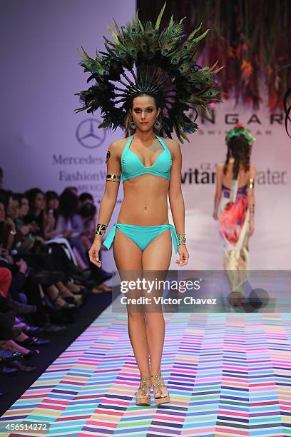 Model walks the runway during Zingara show at Mercedes-Benz Fashion Week México Spring/Summer 2015 at Campo Marte on October 1, 2014 in Mexico City,...