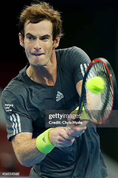 Andy Murray of Great Britain plays a backhand in his match against Pablo Cuevas of Uruguay during day six of of the China Open at the National Tennis...