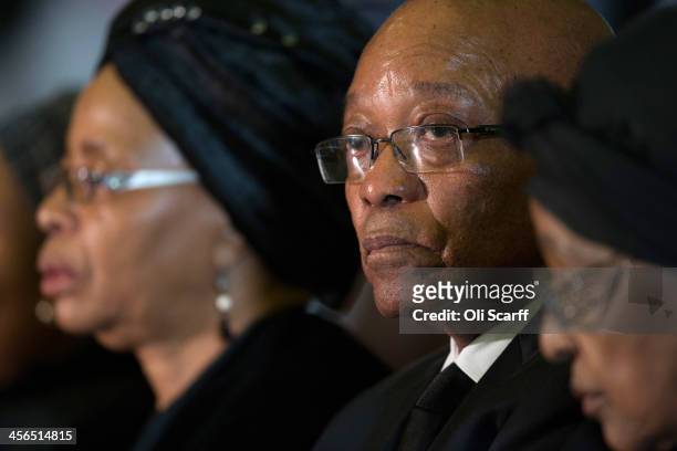 South Africa's President Jacob Zuma sits with Graca Machel , widow of Nelson Mandela, and Winnie Mandela former wife of Nelson Mandela during an...