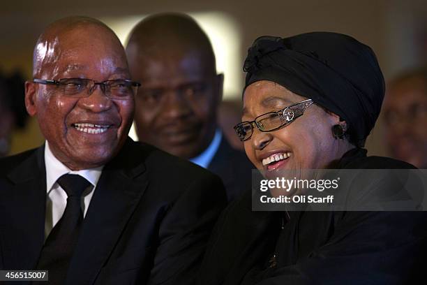 South African president Jacob Zuma shares a joke with with Winnie Mandela, a former wife of Nelson Mandela, during an African National Congress led...