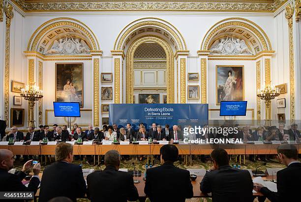 British Foreign Secretary Philip Hammond addresses delegates at the "Defeating Ebola: Sierra Leone" conference in central London, on October 2, 2014....