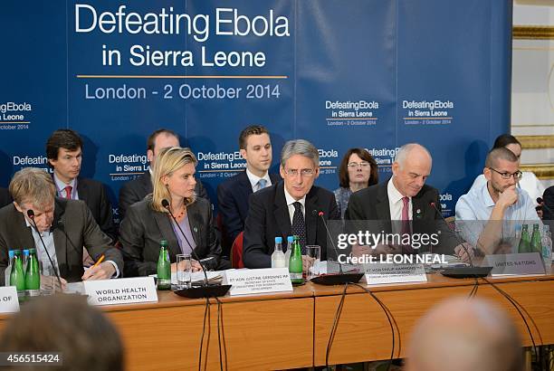 British Foreign Secretary Philip Hammond addresses delegates at the "Defeating Ebola: Sierra Leone" conference in central London, on October 2, 2014....