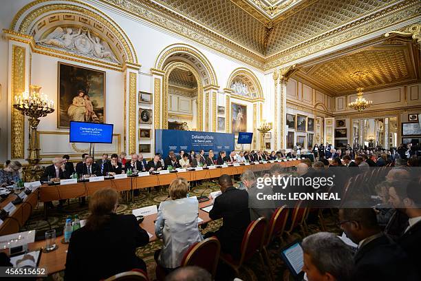 General view of delegates attending the "Defeating Ebola: Sierra Leone" conference is pictured in Lancaster House in central London, on October 2,...