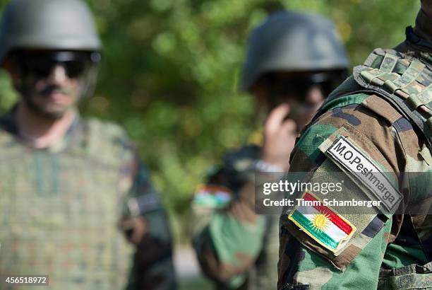 The national flag of Kurdistan is seen on the uniform of a peshmerga fighter during training on October 02, 2014 in Hammelburg, Germany. A total of...