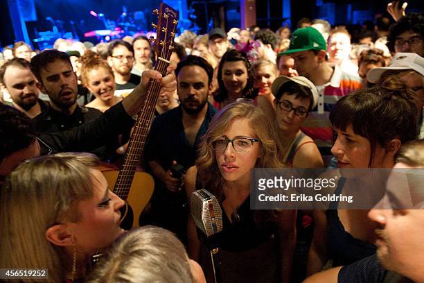 Holly Laessig and Jess Wolfe of Lucius along with Rachel Price and Bridget Kearney of Lake Street Dive perform in the crowd at Tipitina's on October...