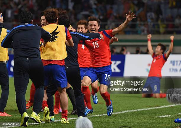 Rim Changwoo of South Korea celebrates scoring his team's first goal during the Football Men's Gold Medal match between South Korea and North Korea...