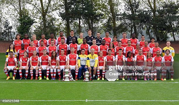 The Men and Ladies first team squads pose during the Arsenal Squad photo shoot 2014/15 at London Colney on September 11, 2014 in St Albans, England....