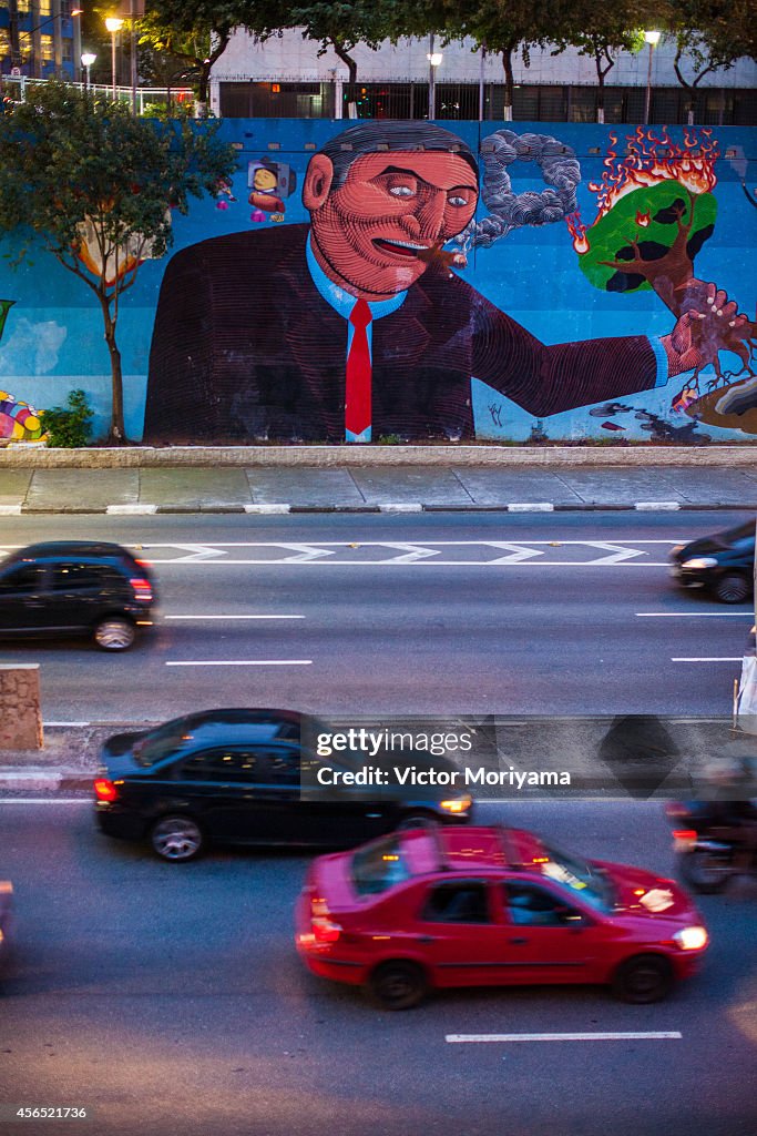 Renowned Brazilian street artist Nunca Works On New Mural In Sao Paulo