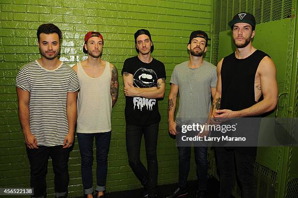 Simon Mitchell, John Taylor, Gustav Wood, Fraser Taylor and Ben Jolliffe of Young Guns pose for a portrait at Revolution on October 1, 2014 in Fort...