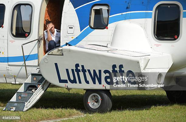 Female German soldier waits for German Defence Minister Ursula von der Leyen as she leaves after visiting peshmerga fighters on October 02, 2014 in...