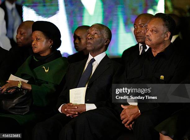 National chairperson Baleka Mbete, former president Thabo Mbeki and Reverend Jesse Jackson at the official send-off for Nelson Mandela at the...