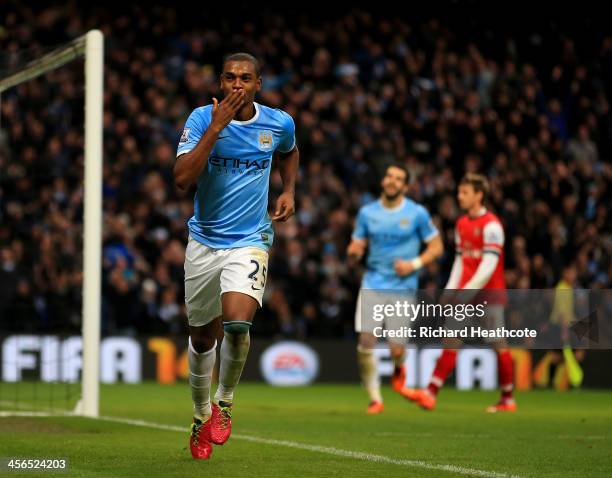 Fernandinho of Manchester City celebrates scoring their fifth goal during the Barclays Premier League match between Manchester City and Arsenal at...