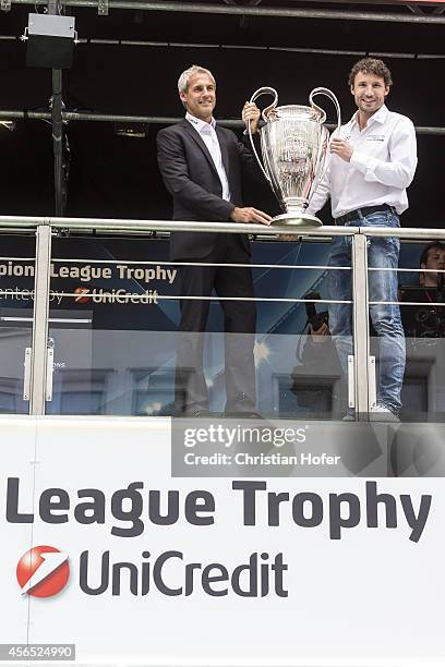 Champions League Trophy is presented to the public by UEFA Ambassador Michael Konsel and UEFA Ambassador Mark van Bommel during the Unicredit UEFA...