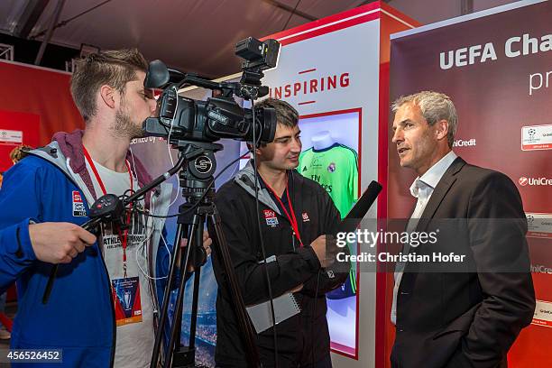 Ambassador Michael Konsel is interviewed after the press conference prior to the Unicredit UEFA Champions League Trophy Tour on October 2, 2014 in...