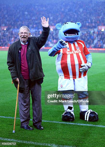 Former Stoke kitman Neil 'Nello' Baldwin waves to the crowd before the Barclays Premier League match between Stoke City and Newcastle United at the...