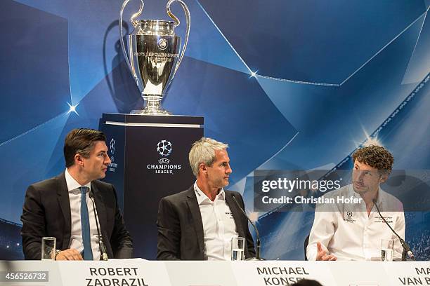 Bank Austria Board Member Robert Zadrazil, UEFA Ambassador Michael Konsel and UEFA Ambassador Mark van Bommel attend the press conference prior to...