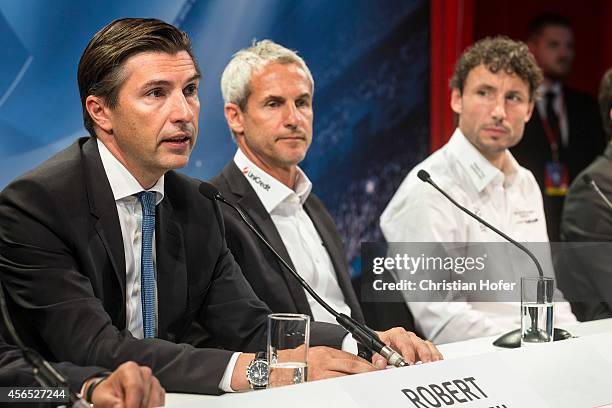 Bank Austria Board Member Robert Zadrazil, UEFA Ambassador Michael Konsel and UEFA Ambassador Mark van Bommel attend the press conference prior to...