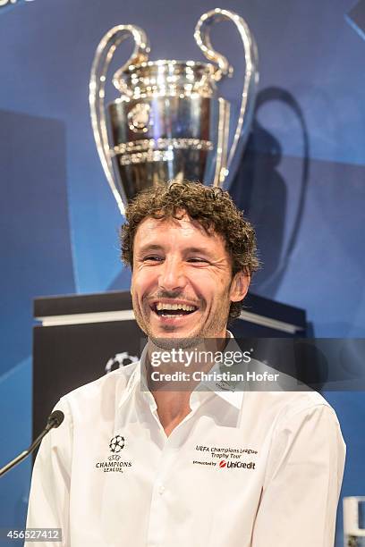Ambassador Mark van Bommel attends the press conference prior to the Unicredit UEFA Champions League Trophy Tour on October 2, 2014 in Vienna,...