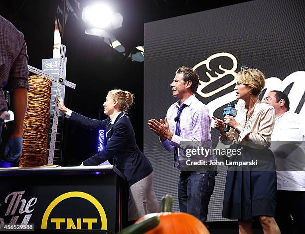 Adjudicator Morgan Wilbur, Ty Pennington and ABC Anchor Amy Robach and Chef Emeril Lagasse attend the "On The Menu" Cooking Demo & Guinness World...