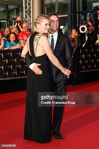 Anna Loos and Jan Josef Liefers attend the red carpet of the Deutscher Fernsehpreis 2014 on October 02, 2014 in Cologne, Germany.