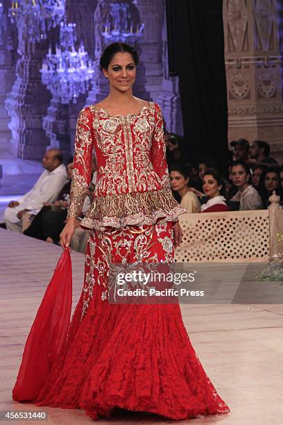 Pakistani Model Ramp Models walk on a ramp to present the creations of a famous Pakistani ...