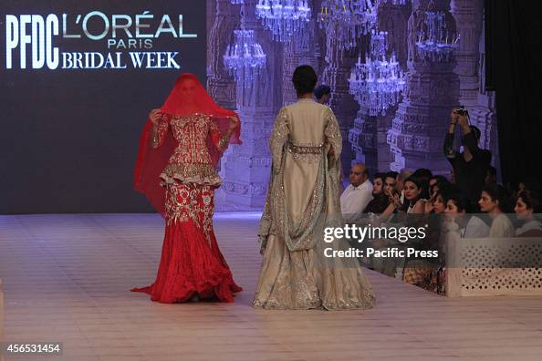 Pakistani Model Ramp Models walk on a ramp to present the creations of a famous Pakistani ...