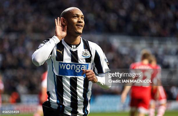 Newcastle United's French striker Yoan Gouffran celebrates scoring the opening goal during the English Premier League football match between...