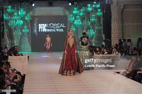 Pakistani Model Ramp Models walk on a ramp to present the creations of a famous Pakistani ...