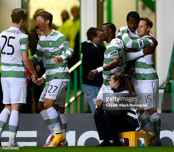 Kris Commons of Celtic celebrates scoring the first goal with team-mates during the UEFA Europa League group D match between Celtic and Dinamo Zagreb...