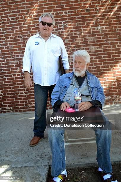 Artists Laddie John Dill and Ed Moses pose for a portrait at the Abbot Kinney Festival on September 28, 2014 in Los Angeles, California .