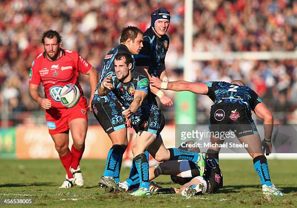 Haydn Thomas of Exeter Chiefs feeds a pass during the Heineken Cup Pool Two match between Toulon and Exeter Chiefs at the Felix Mayol Stadium on...