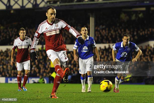 Dimitar Berbatov of Fulham scores his team's first goal from the penalty spot during the Barclays Premier League match between Everton and Fulham at...